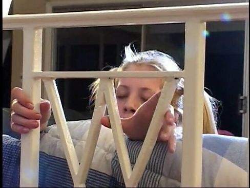 Naughty blonde teen slides thick dildo up her tight pussy